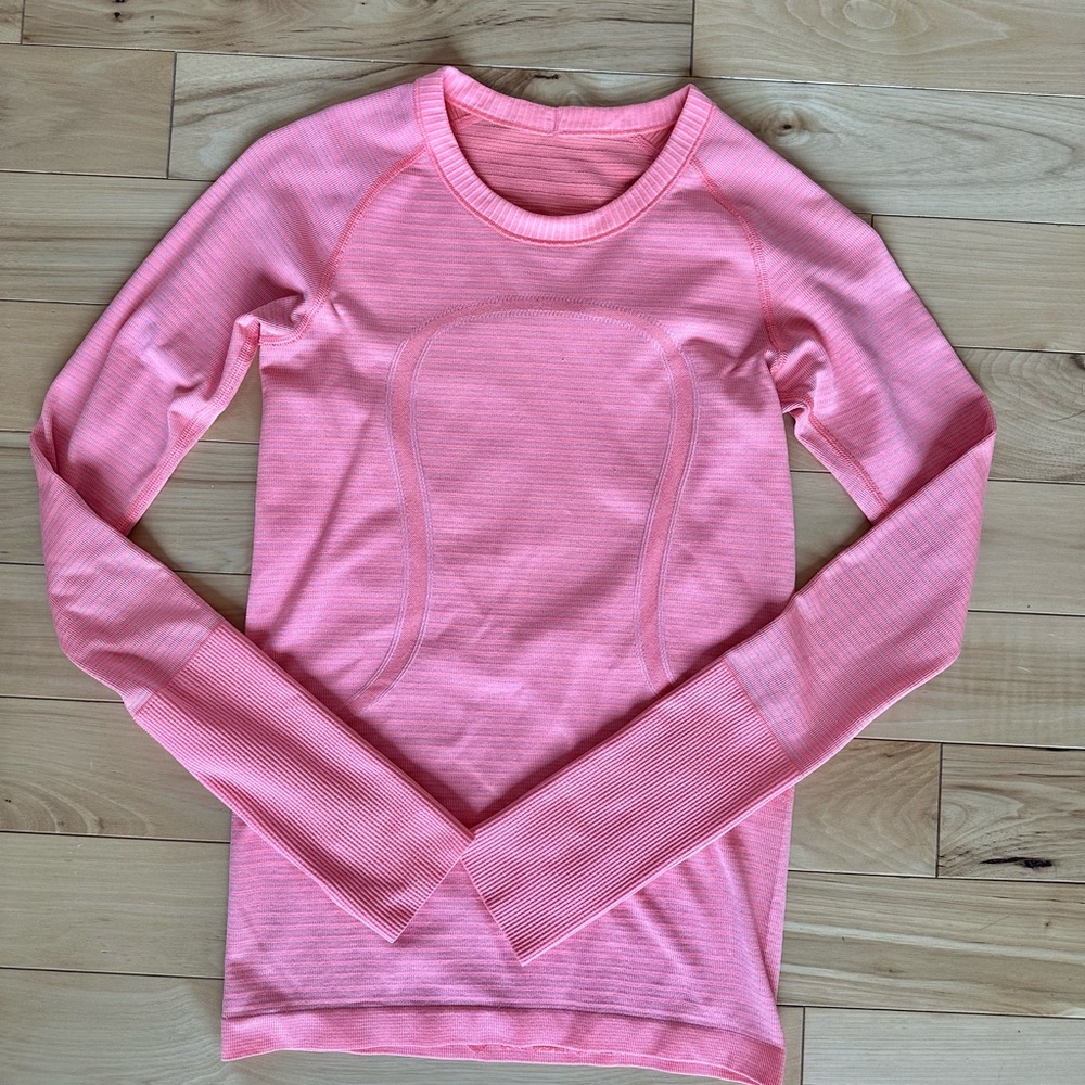 Lululemon Swiftly Long Sleeve size 4 in coral orange. Standard length